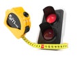 Red traffic light with measuring tape