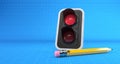 Red traffic light with pencil on blueprint background Royalty Free Stock Photo