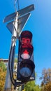 Red traffic light with time delay. Vertical photo. Traffic light on a taxi with a stop signal in the daytime