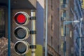 Red traffic light with timer in a blurred city background. City Street Traffic Light Showing Crossing Street Caution Royalty Free Stock Photo