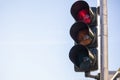 Red traffic lights for cars, blue sky background Royalty Free Stock Photo