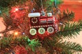 Red Train Closeup on a Christmas Tree Royalty Free Stock Photo