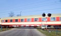 Red train crossing.