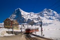 Red train of Jungfrau Bahn at Kleine Scheidegg station