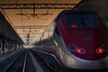 Red Train Stop Railway Station Platform Lights on Royalty Free Stock Photo