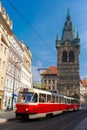 Red tram near Jindrisska Tower in Prague, Czech Royalty Free Stock Photo