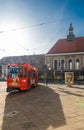 Red tram ride in front of Gorlitz Bahnhof building