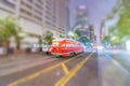 Red tram speeding up in Market Street at night, San Francisco Royalty Free Stock Photo