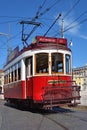 Red tram on a square Praca de Comercio in Lisbon, Portugal Royalty Free Stock Photo