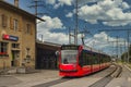 Red tram into a tram station in Bern Royalty Free Stock Photo