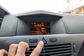 Red triangle emergency button in a car interior Royalty Free Stock Photo