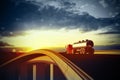 Red truck on blurry asphalt road Royalty Free Stock Photo