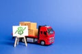 Red truck loaded with boxes and stand with a green dollar up arrow. Raise economic indicators and sales. Exports imports