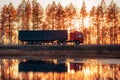 Red truck on a road at sunset Royalty Free Stock Photo