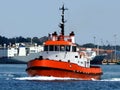 Red Tugboat Underway in Port. Royalty Free Stock Photo