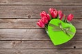 Red tulip flowers bouquet in heart gift box Royalty Free Stock Photo