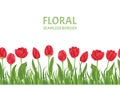 Red Tulips flowers seamless border. Blooming tulips in green grass isolated on white background. Royalty Free Stock Photo