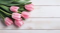 red tulips on a wooden table, capturing the beauty and freshness of nature indoors. Easter, Women\'s Day, Mother\'s day.