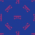 Red TV table stand icon isolated seamless pattern on blue background. Vector Royalty Free Stock Photo