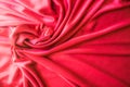 Red twisted silk or satin luxury fabric texture can use as abstract background. Top view Royalty Free Stock Photo