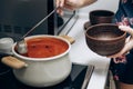 Red Ukrainian borscht on the table. Cooking the national first course