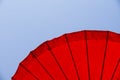 Red umbrella blue sky background Royalty Free Stock Photo