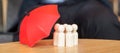 Red umbrella cover man wooden from crowd of employees. People, Business, Human resource management, Life Insurance and Teamwork