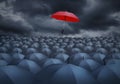 Red umbrella outstanding from the others Royalty Free Stock Photo