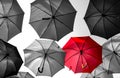 Red umbrella standing out Royalty Free Stock Photo