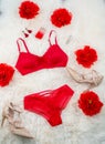 Red underwear knickers and bra perfume juwelery red flowers gold shoes