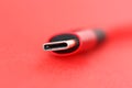 Red usb cable end lying on table Royalty Free Stock Photo