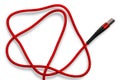 Red usb cable for phone and tablet on a white background. Communication concept, technology, accessories for cell phones Royalty Free Stock Photo