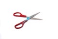 Red used scissors with paint splatter isolated on white background Royalty Free Stock Photo