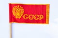 Red ussr flag on a stick on an isolated white background since soviet times Royalty Free Stock Photo