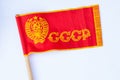 Red ussr flag on a stick on an isolated white background since soviet times Royalty Free Stock Photo