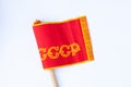 Red ussr flag on a stick on an isolated white background since soviet times Royalty Free Stock Photo