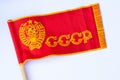 Red ussr flag on a stick on an isolated white background since soviet times Royalty Free Stock Photo