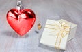 Red valentine or christmas heart with white gift box and gold he Royalty Free Stock Photo