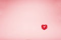 Red valentine heart model on pink background with texting space