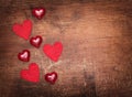 Red valentine hearts on old wooden background Royalty Free Stock Photo