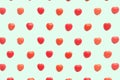 Red Valentine`s day heart candy pattern on green pastel paper color background. Love Concept. colorful hipster style. top view. Royalty Free Stock Photo