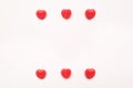 Red Valentine`s day heart shape candy pattern on empty white paper background. Love Concept. colorful hipster style. Knolling top