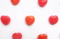 Red Valentine`s day heart shape candy pattern on empty white paper background. Love Concept. colorful hipster style. top view.