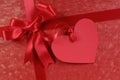 Red valentines day gift, heart shape gift tag or label, copy space Royalty Free Stock Photo
