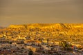 Red Valley and Rose Valley and downtown of Goreme under the sunset in Cappadocia, Turkey. Red Valley and Rose Valley Cappadocia