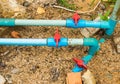Red valve on water pipelines.