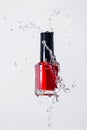 Red varnish in water splashes Royalty Free Stock Photo