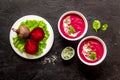 Red vegetarian beet root soup with sour cream and raw beets Royalty Free Stock Photo