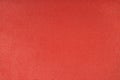 Red velours upholstery fabric texture background. Royalty Free Stock Photo