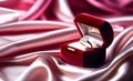 Red velvet box with diamond ring placed on silk Royalty Free Stock Photo